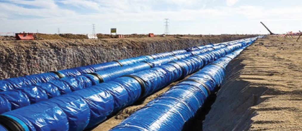 Large-diameter pipeline laid in an open trench